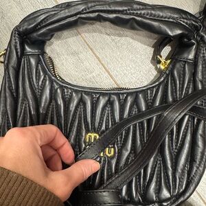 Reposhing this m I u bag